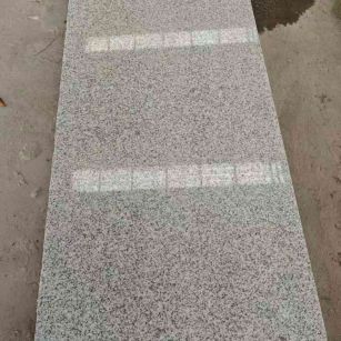 广东芝麻白光面毛板