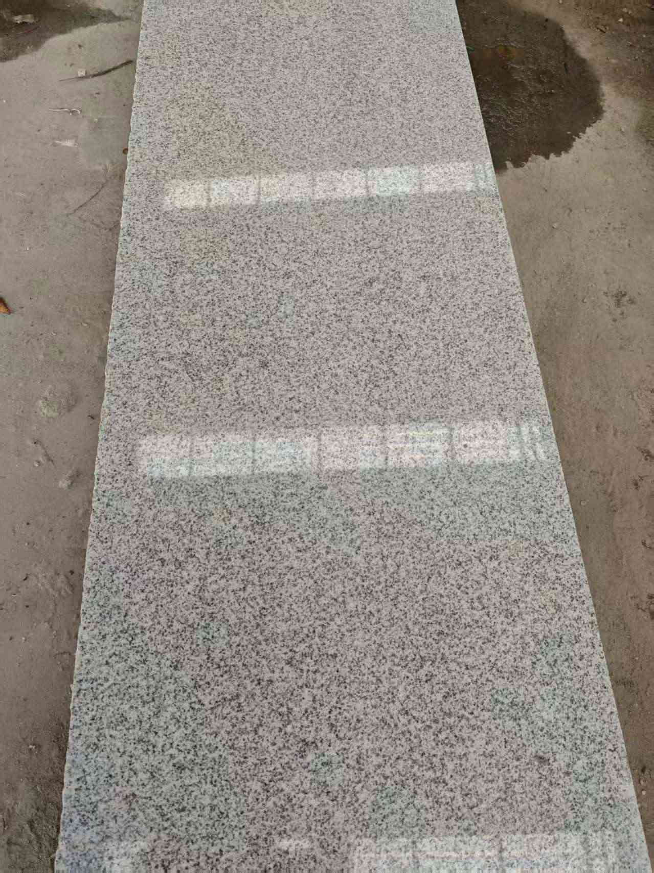 广东芝麻白光面毛板